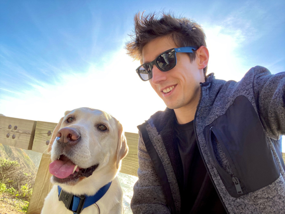 (photo of Marcus and his dog, Riker)
